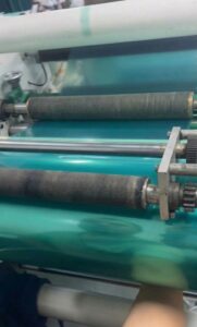 Rewinding PET silicone tape into log rolls