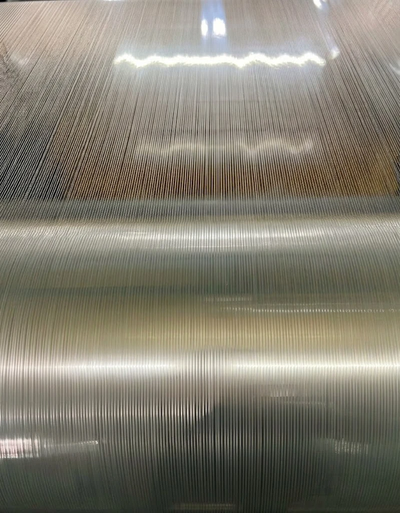 Rewinding filament tape to finished roll length