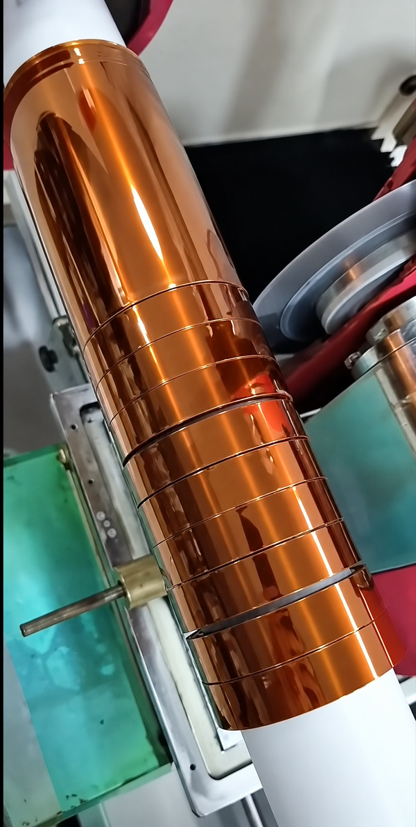 Slitting polyimide tape to the ordered width